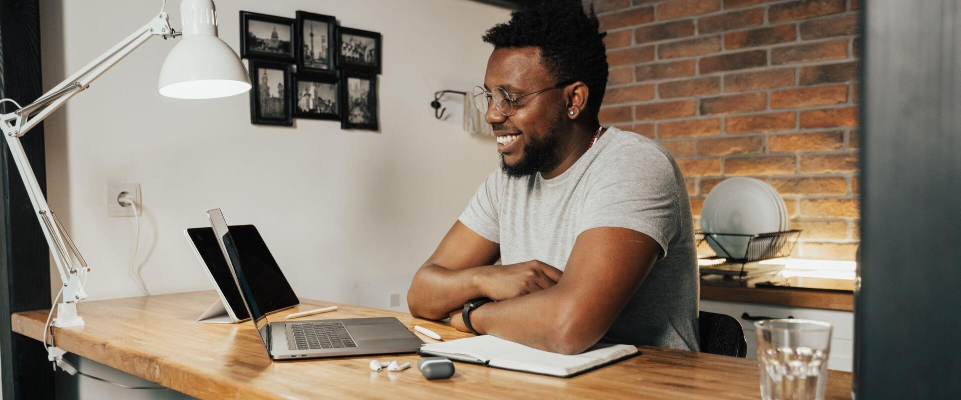 Man sitting home looking for jobs